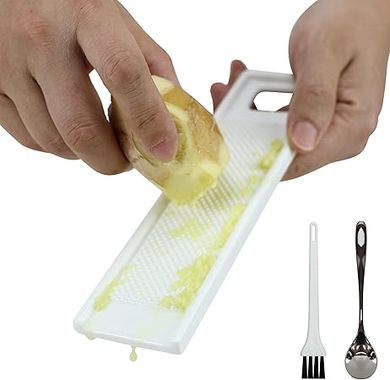 EIKS Ceramic Grater:  Efficiently grates ginger, wasabi, garlic, fruits, & vegetables.
